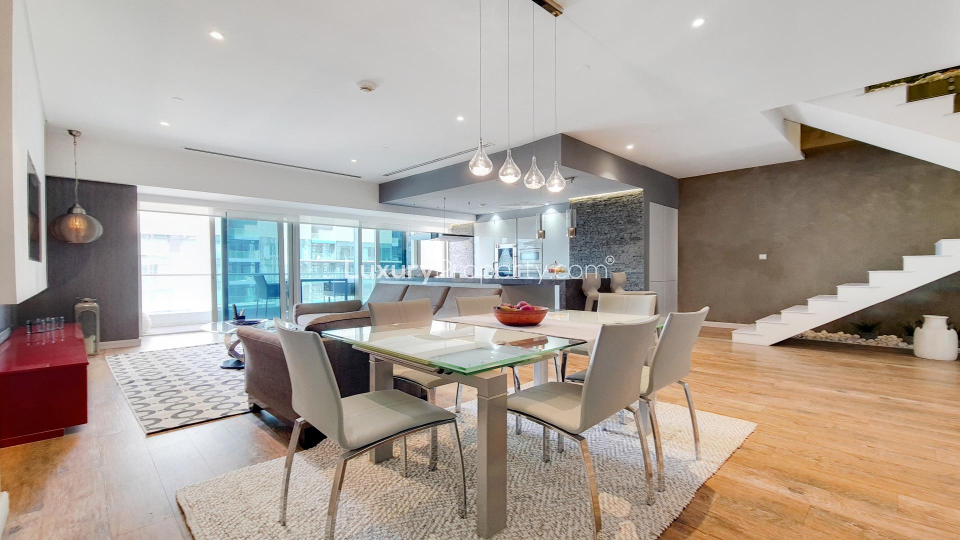 Fully renovated living area in Dubai Marina duplex apartment, modern decor, open kitchen design
