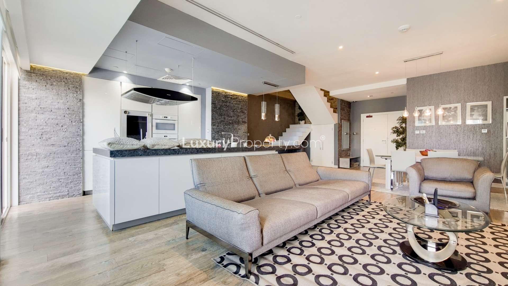 Modern open-plan living area in renovated duplex, Dubai Marina apartment, Marina Heights