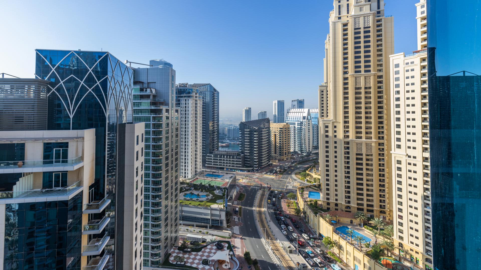 Balcony view of Dubai Marina skyline from Shemara Tower apartment for sale