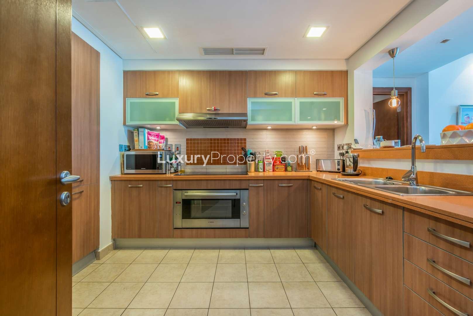 Empty room with tiled floor and bathroom entrance in Palm Jumeirah villa, LP10998