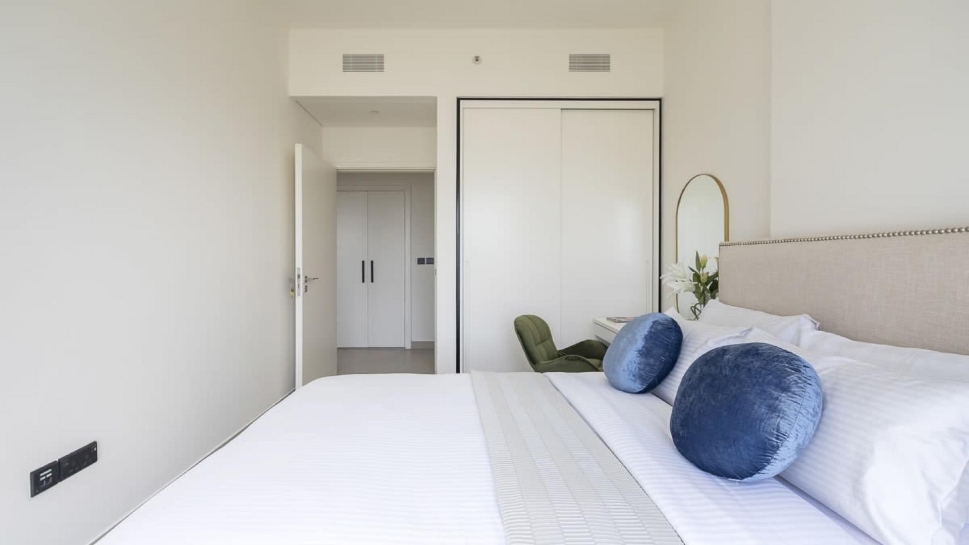 Furnished kitchen and dining area in Dubai Hills Estate apartment, Collective community