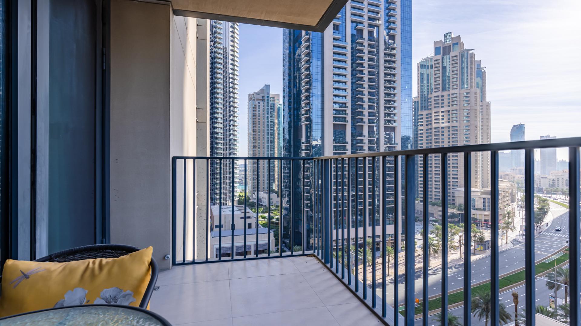 Bright living room with city view in 2-bedroom apartment, BLVD Heights, Downtown Dubai
