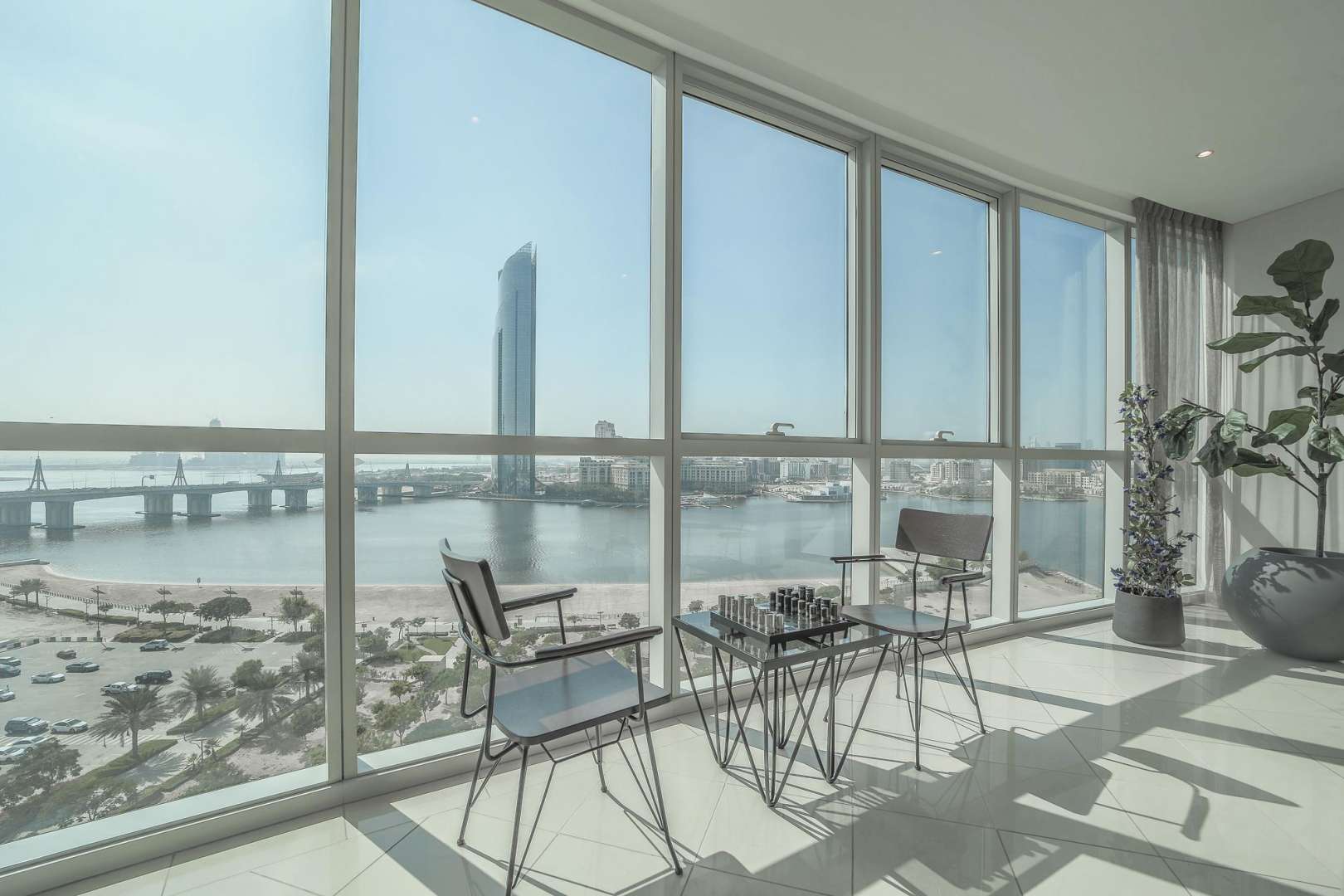 Bright, modern living and dining area in Marsa Plaza, Festival City apartment for sale