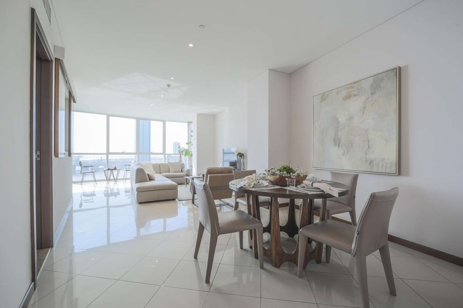 Bright living room in two-bedroom apartment, Marsa Plaza, Dubai Festival City, with city views