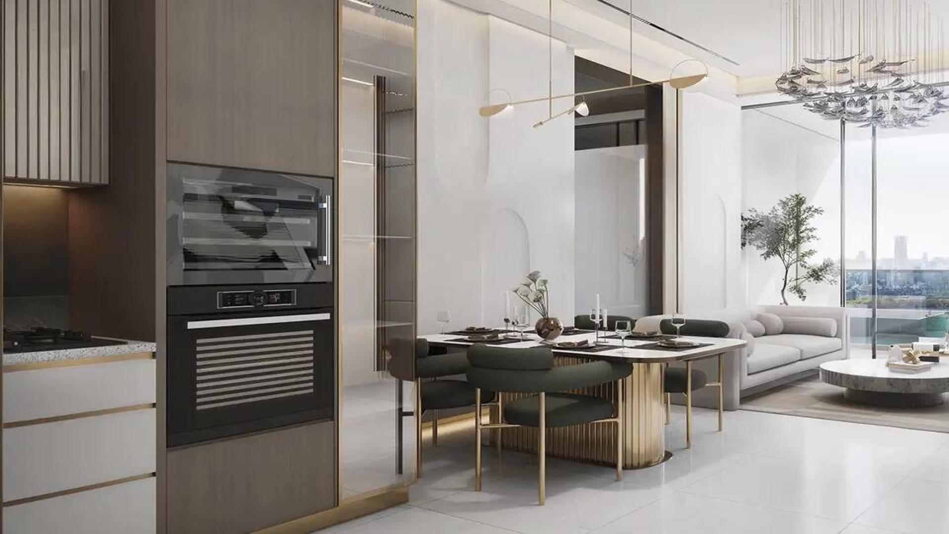 Luxurious kitchen and dining area in beachfront Dubai Islands apartment, Bonds Avenue