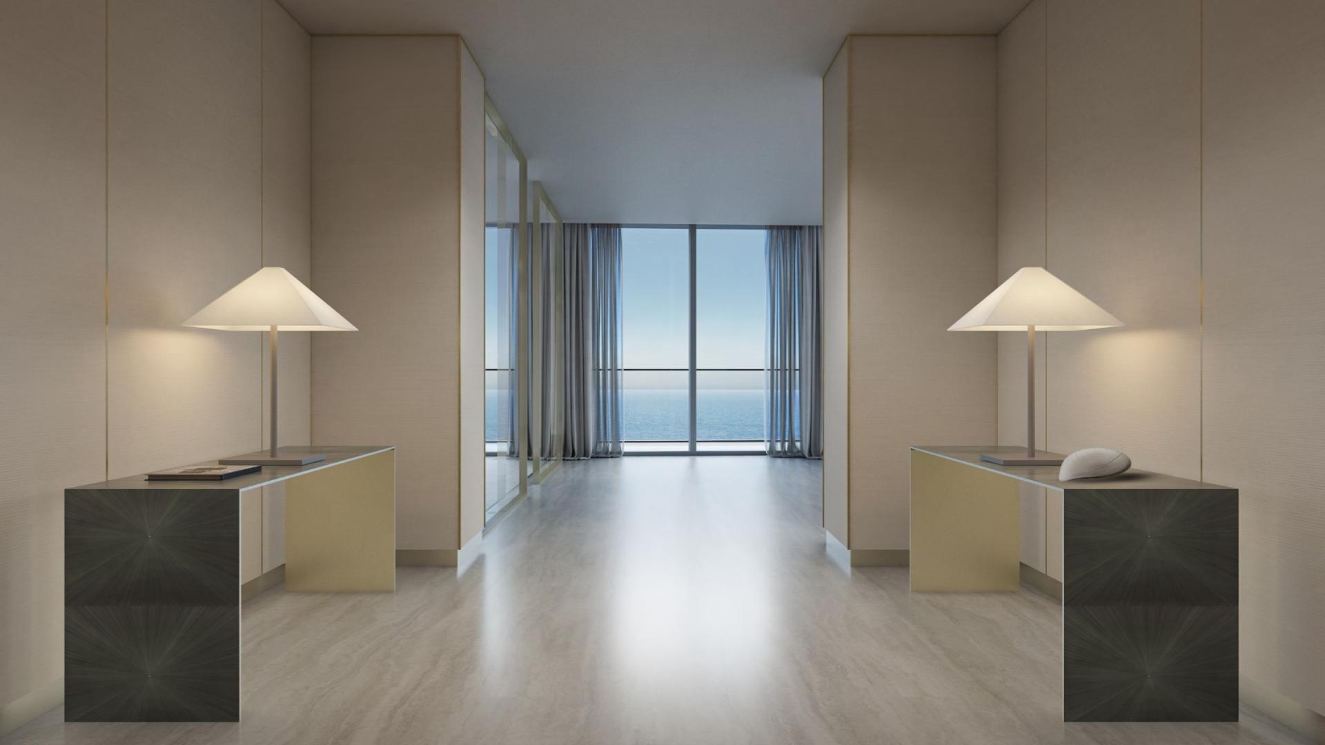 Elegant dining area with ocean view at Armani Beach Residences, Palm Jumeirah apartment