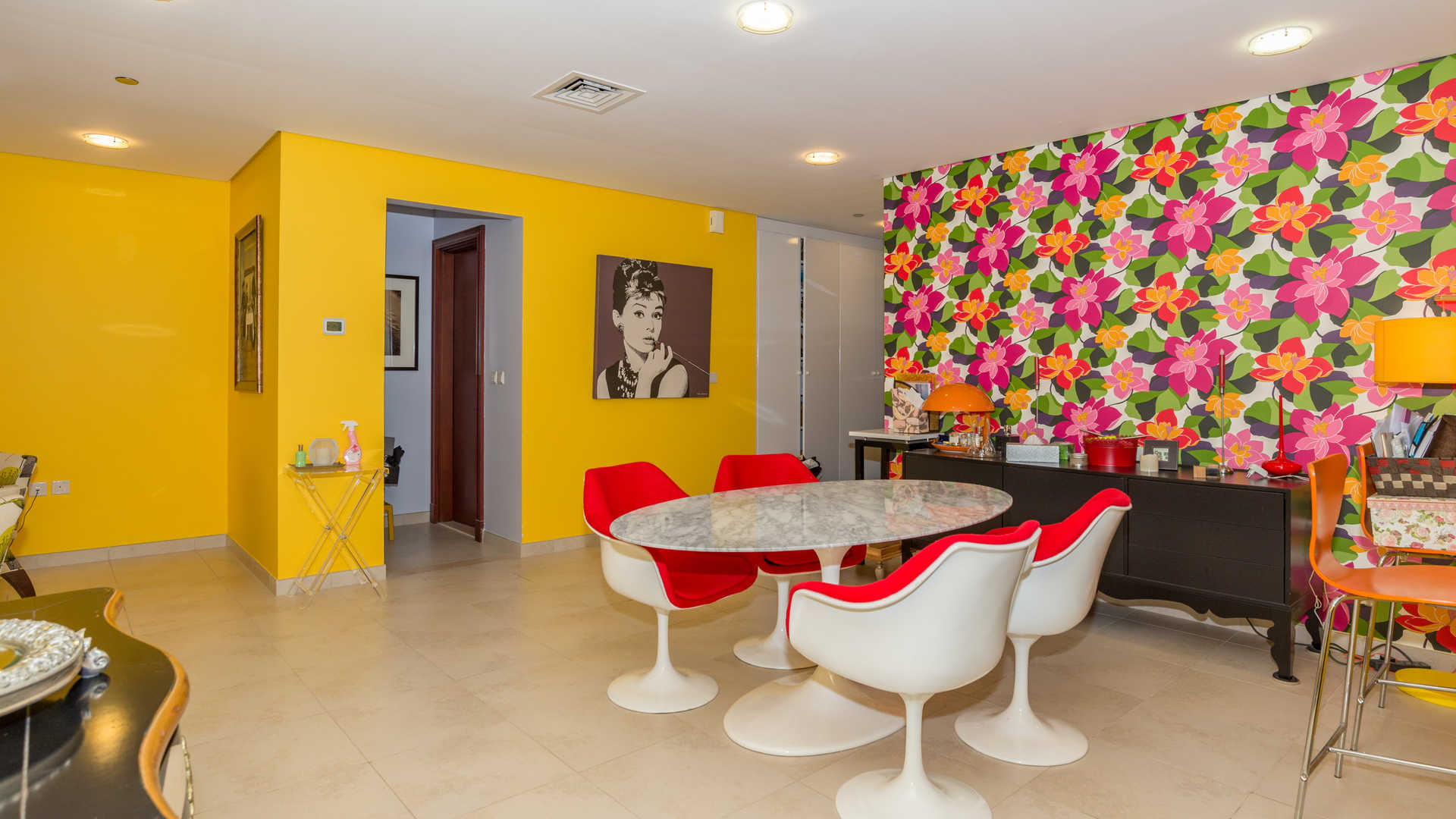 Chic dining area in two-bedroom apartment, Canal Residence, Dubai Sports City. Vibrant decor