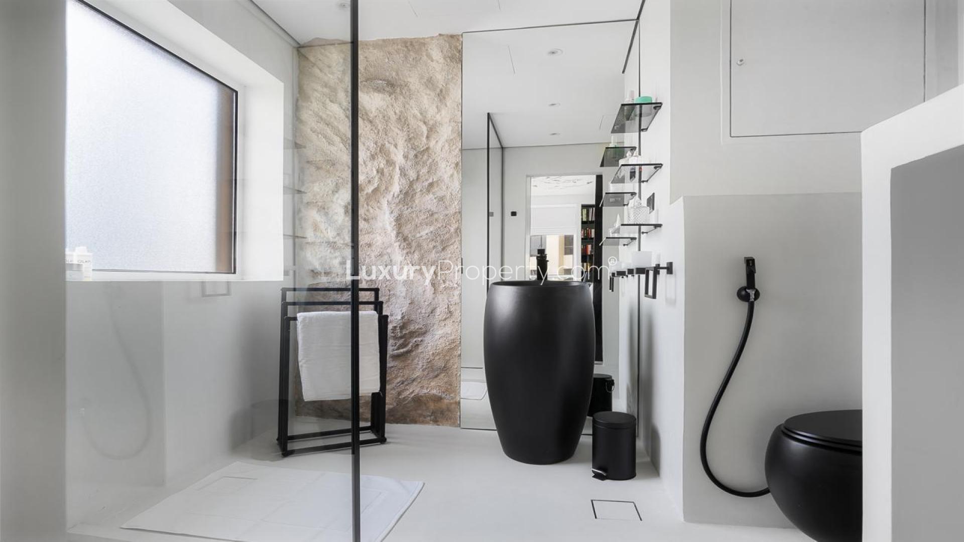 Luxurious bedroom in Bahar apartment, Jumeirah Beach Residence, featuring stylish decor and natural light