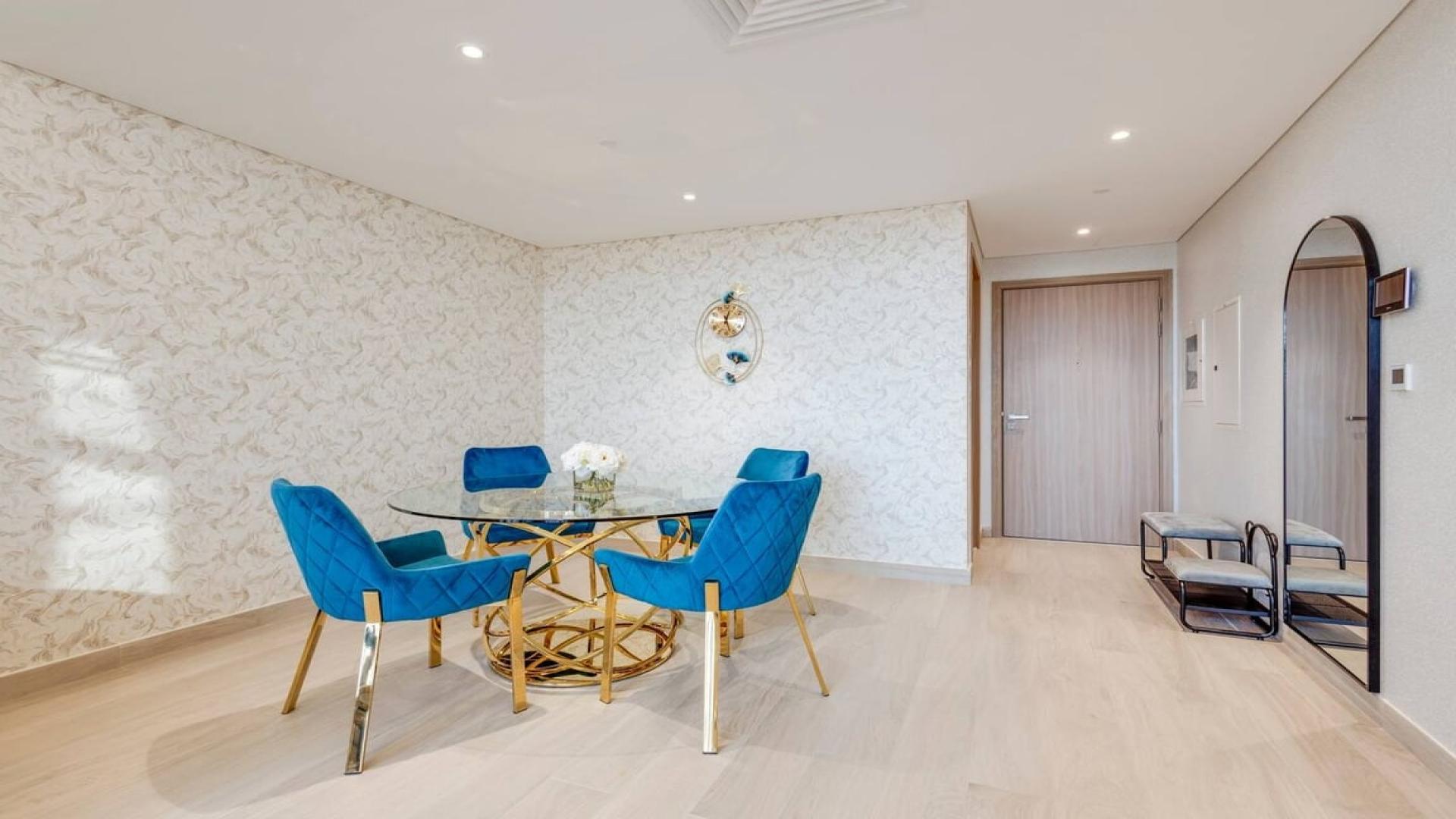 Outdoor pool view in Meydan One apartment complex, elegant urban living setting