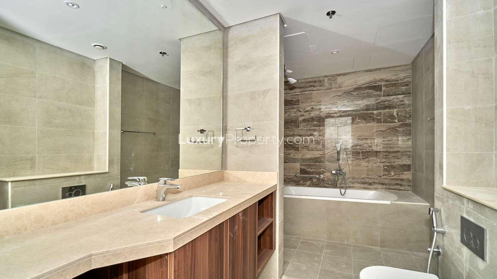 Luxurious bathroom in 2-bedroom apartment, Palm Jumeirah, featuring modern fixtures and elegant design