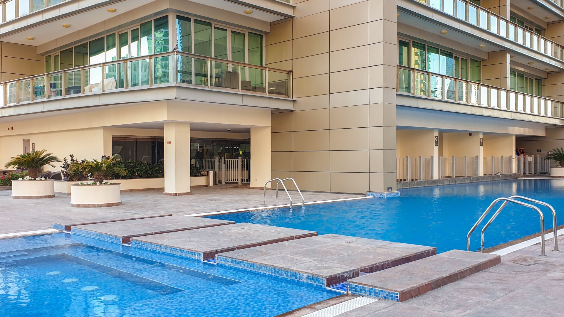 Outdoor pool area at residential apartment, Downtown Dubai, Mohammad Bin Rashid Boulevard