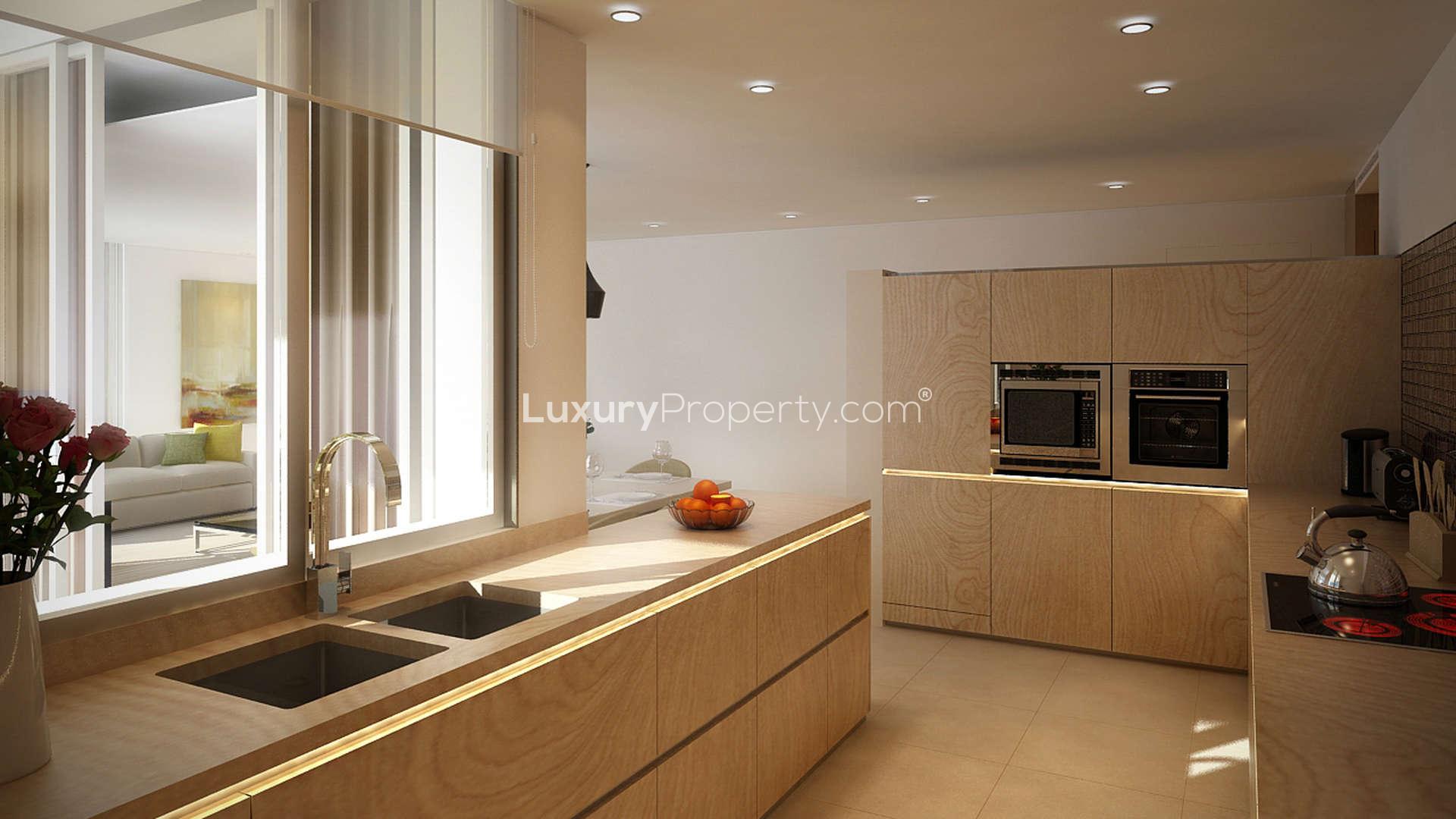 Fully furnished living and dining area in Monte Rei Golf apartment, Algarve, Portugal