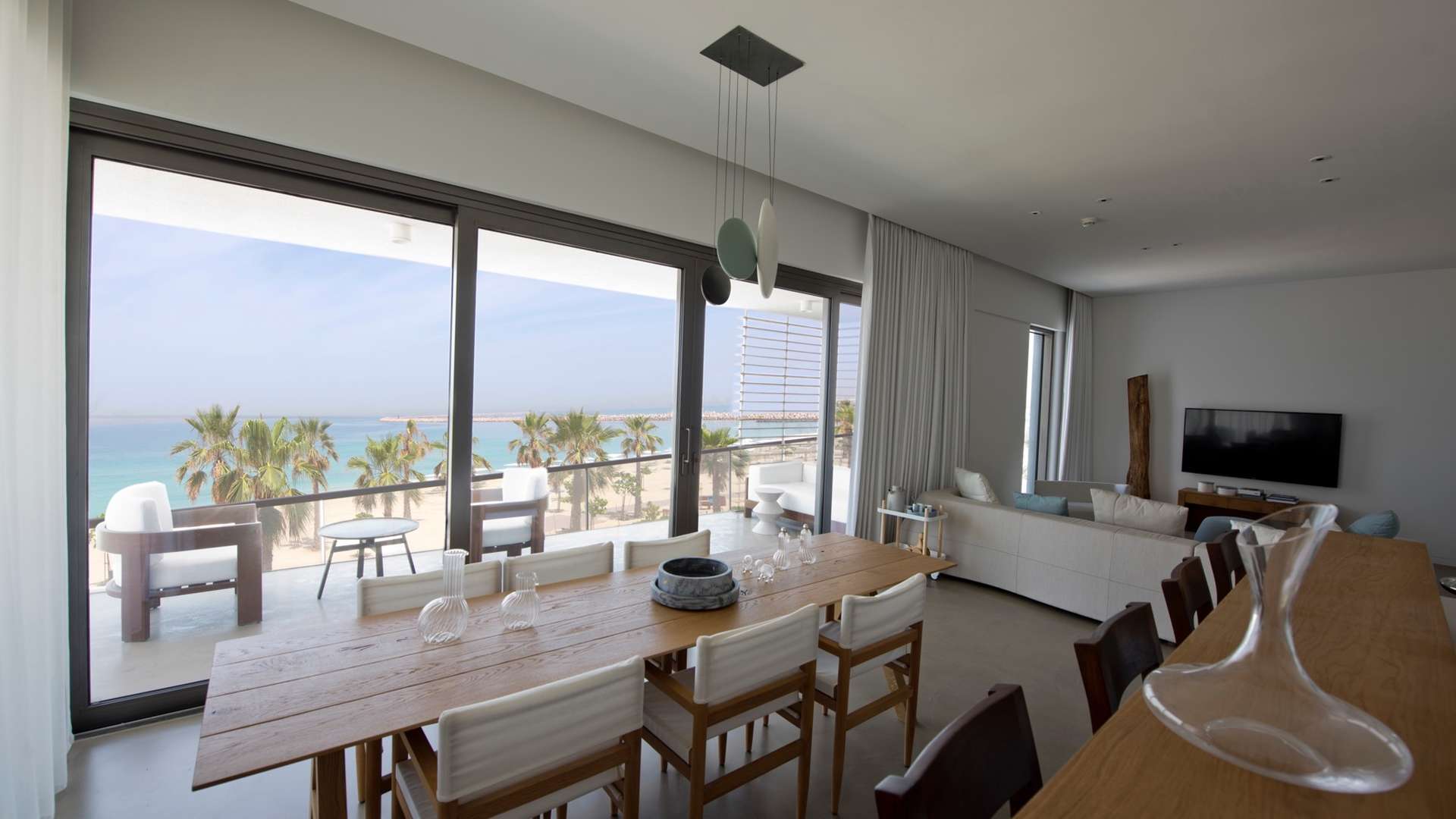 Open-plan living area with sea view in Pearl Jumeirah apartment for sale