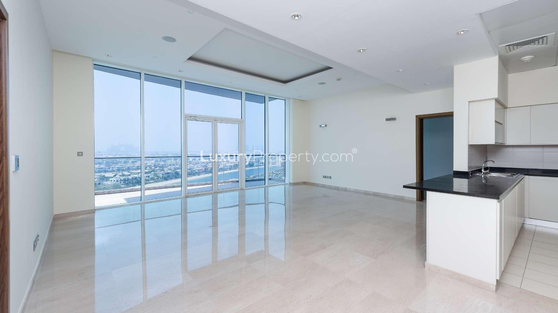 High-floor apartment view of Palm Jumeirah marina, sea, and sunset in Oceana community