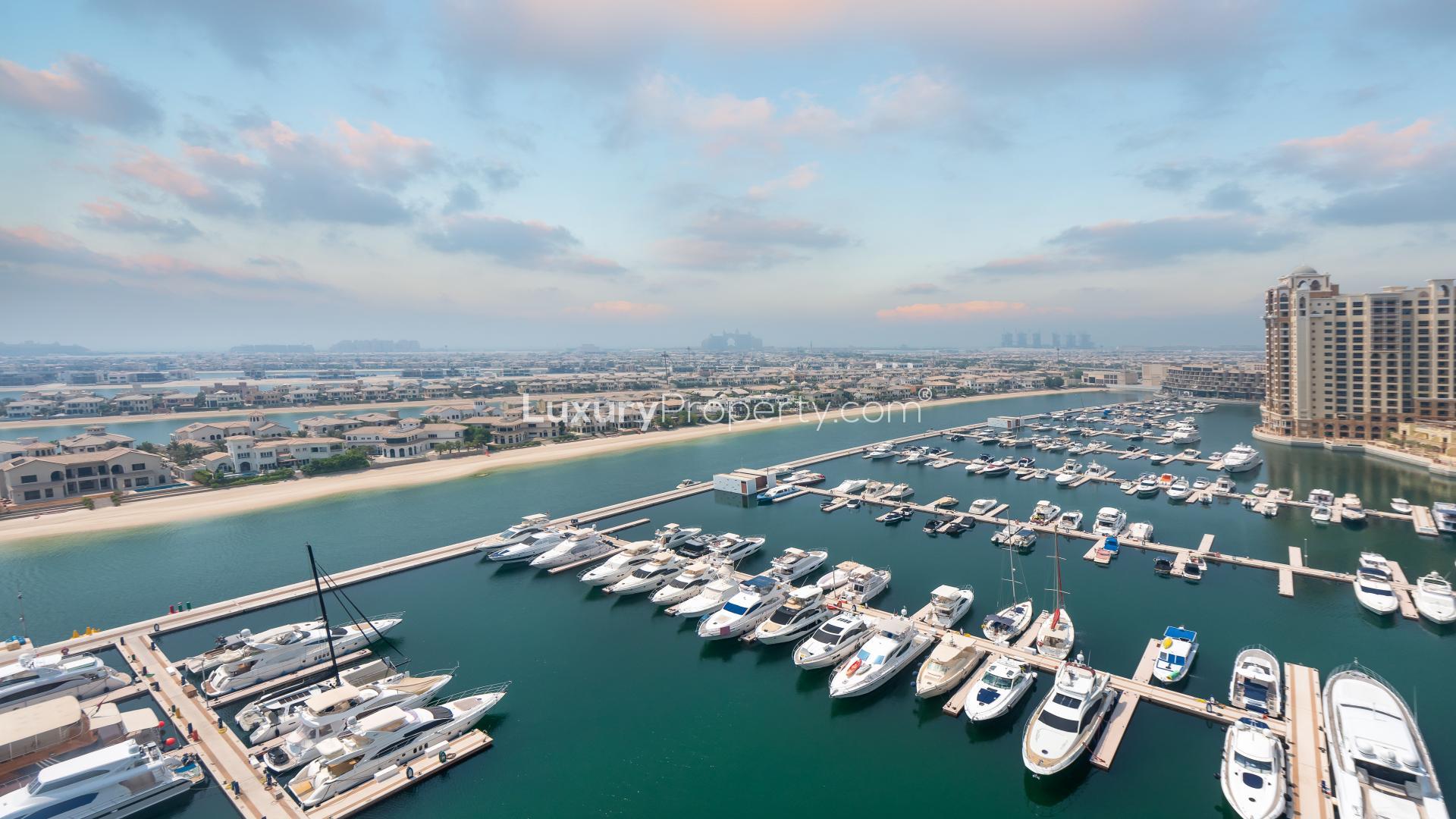 High floor apartment balcony with sea and sunset views in Palm Jumeirah, Oceana