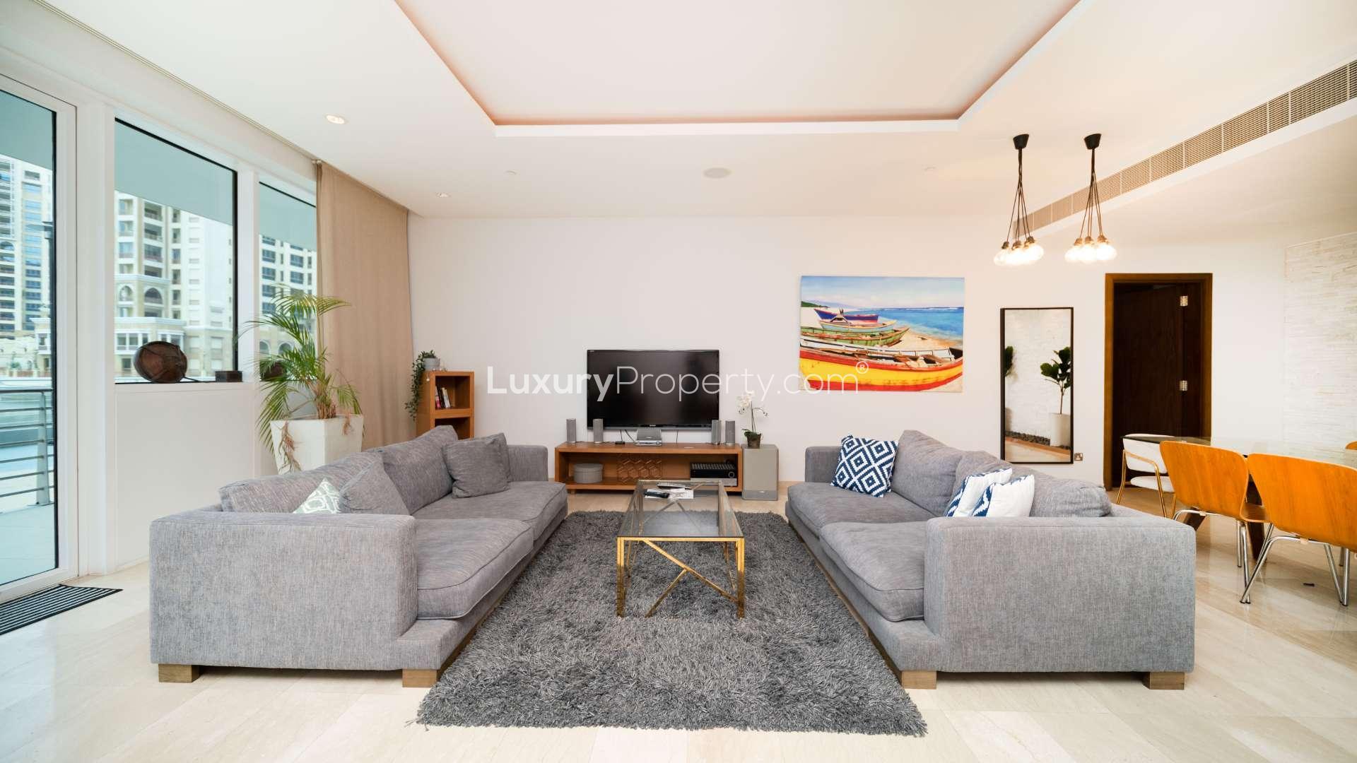 Modern living room in Oceana apartment, Palm Jumeirah, with stylish decor and natural light