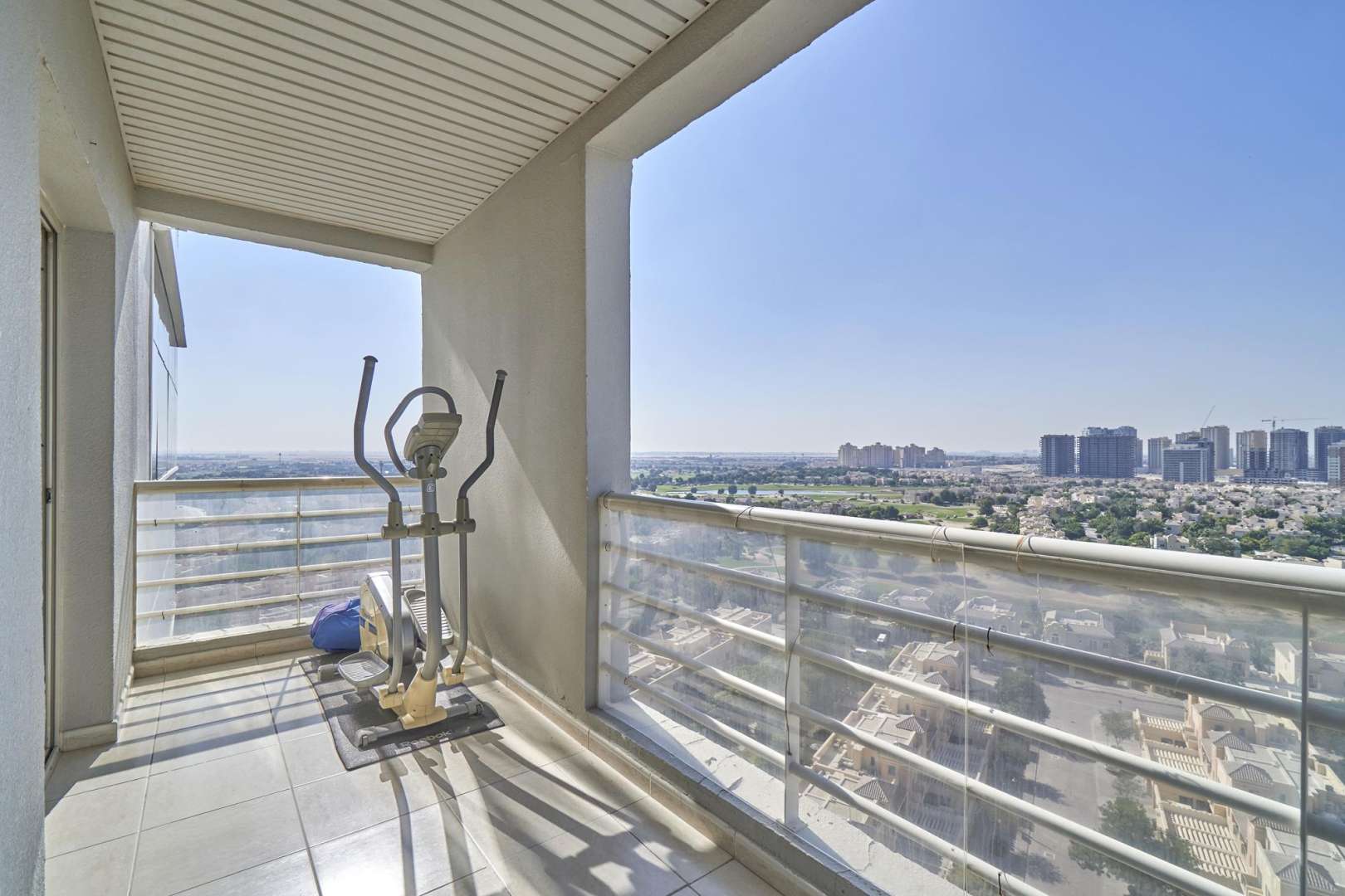 Balcony view from 2-bedroom apartment in Olympic Tower 1, overlooking Dubai Sports City golf course