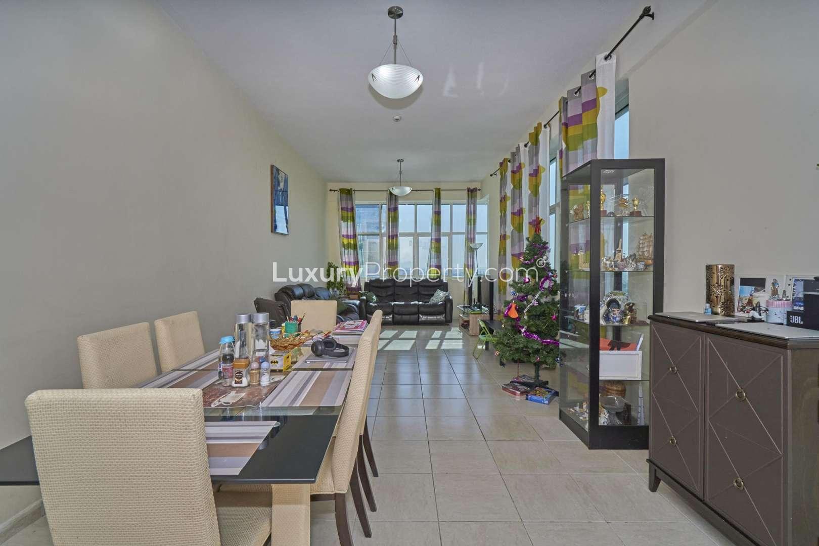 Dining and living area in 2-bedroom apartment, Olympic Tower 1, Dubai Sports City