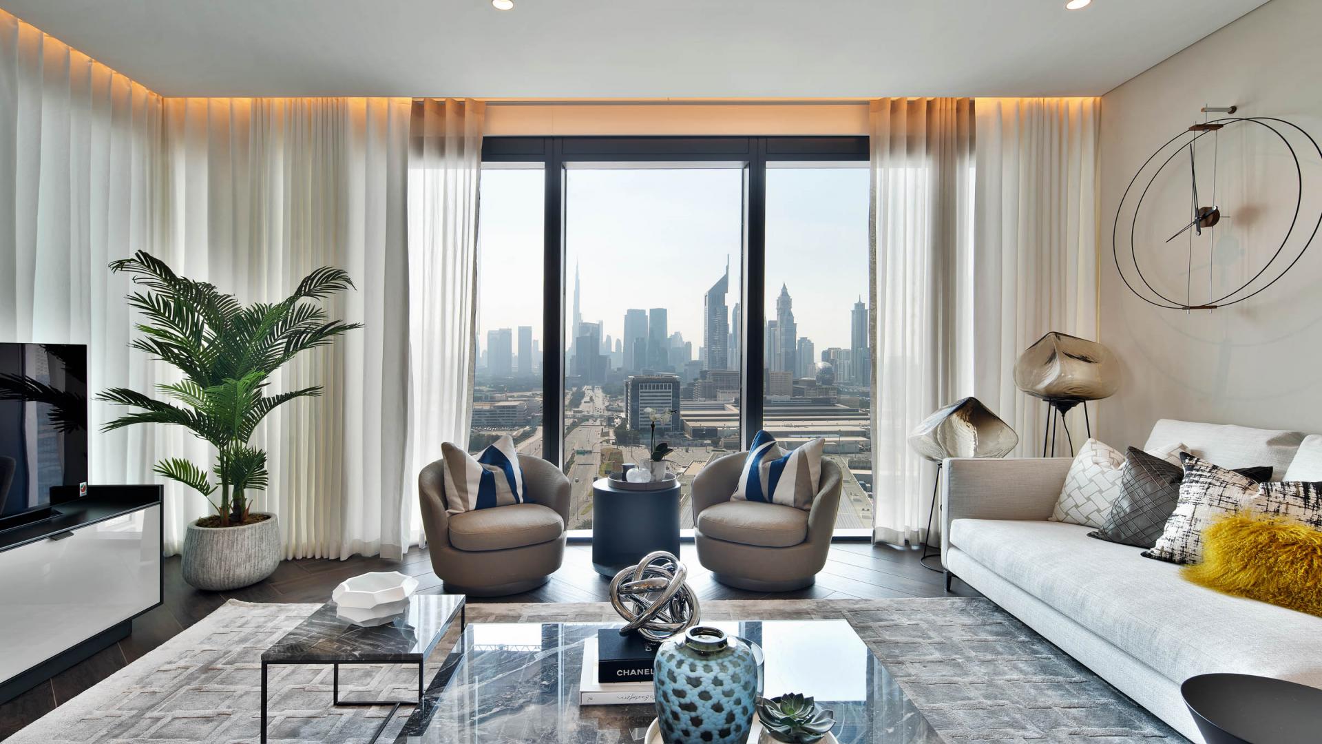 Modern living and dining area in Zabeel 1 apartment with city views