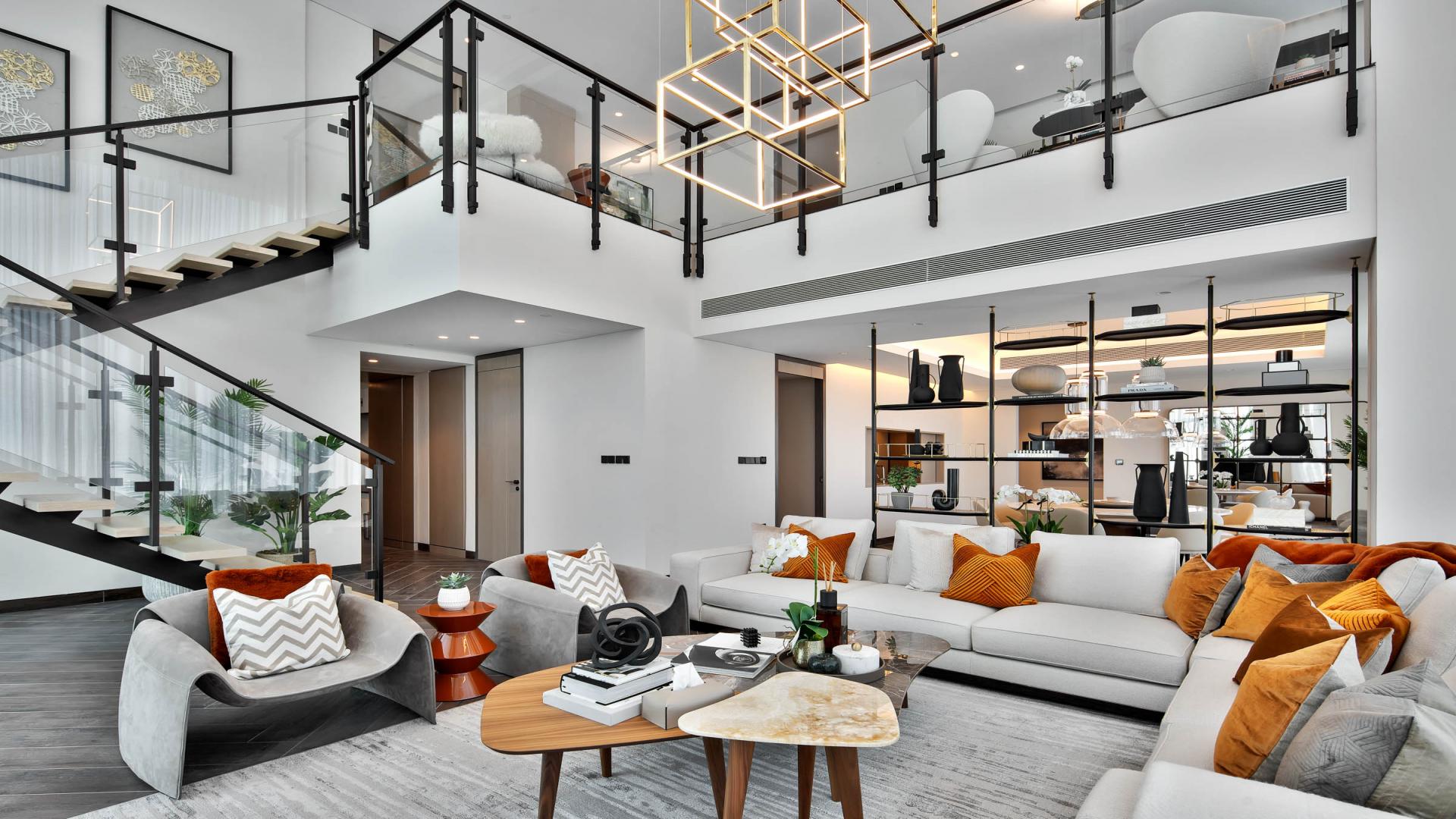 Luxurious living room in Zabeel 1 duplex apartment with stylish staircase and modern decor