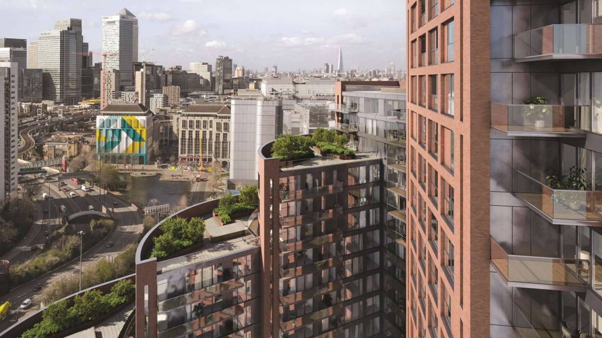 Modern kitchen in Orchard Wharf duplex, featuring sleek design and spacious layout