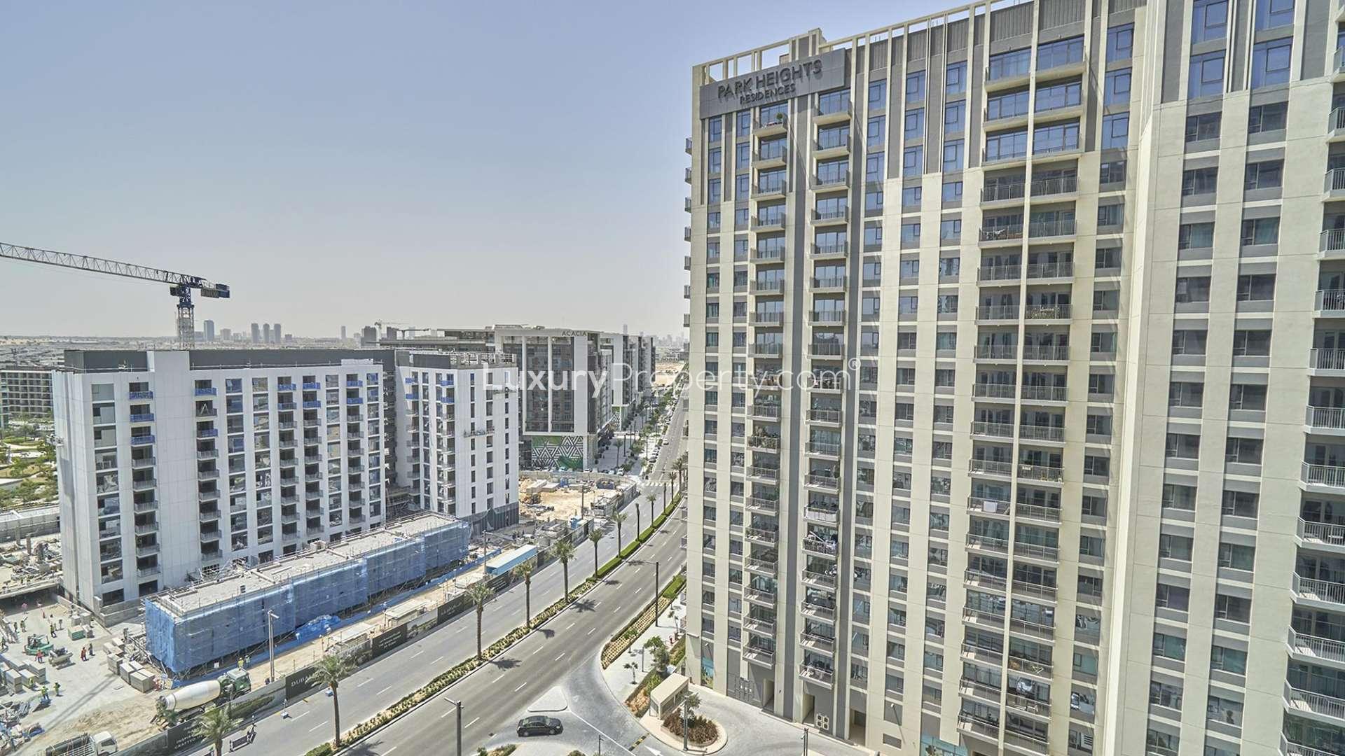 Bright living room with large windows in Park Heights II apartment, Dubai Hills Estate