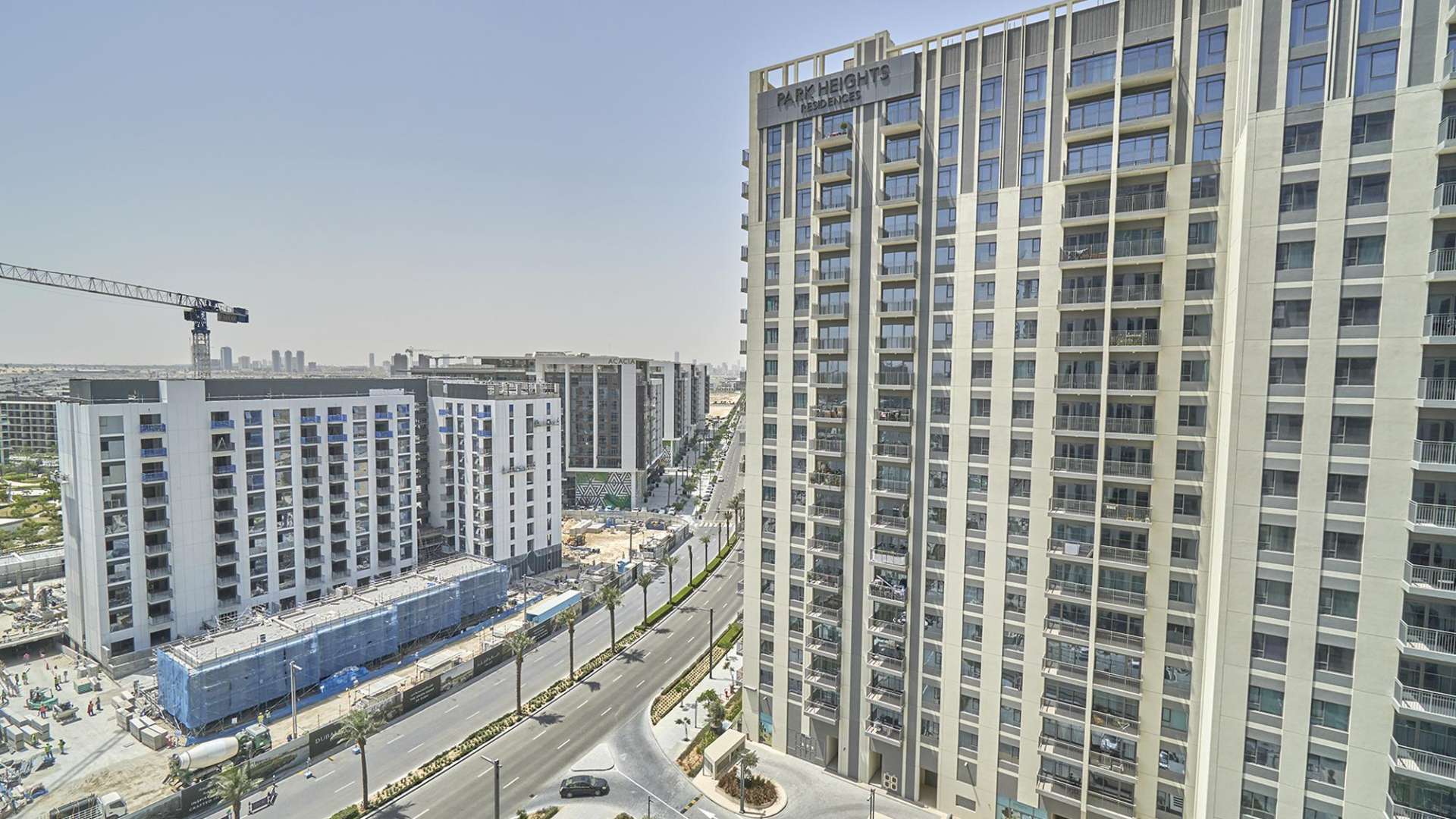 Bright living room with large windows in Park Heights II apartment, Dubai Hills Estate