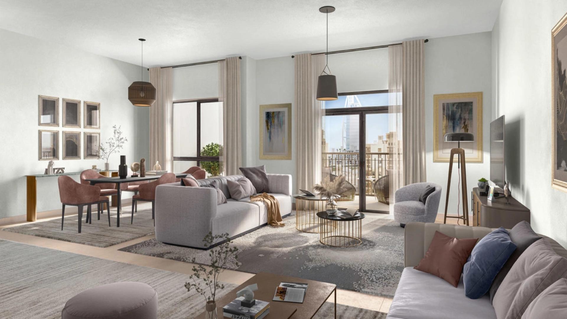 Modern living room with dining area and park view in Al Jazi apartment, Madinat Jumeirah