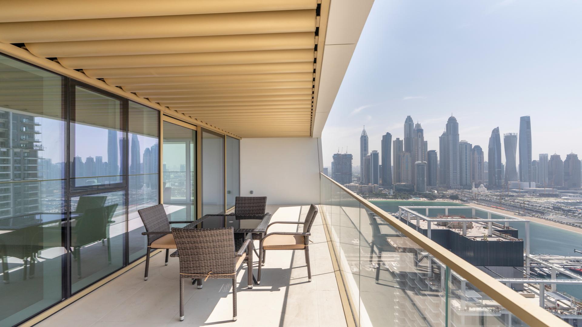 Luxury apartment balcony with stunning waterfront and city skyline views in Dubai Harbour