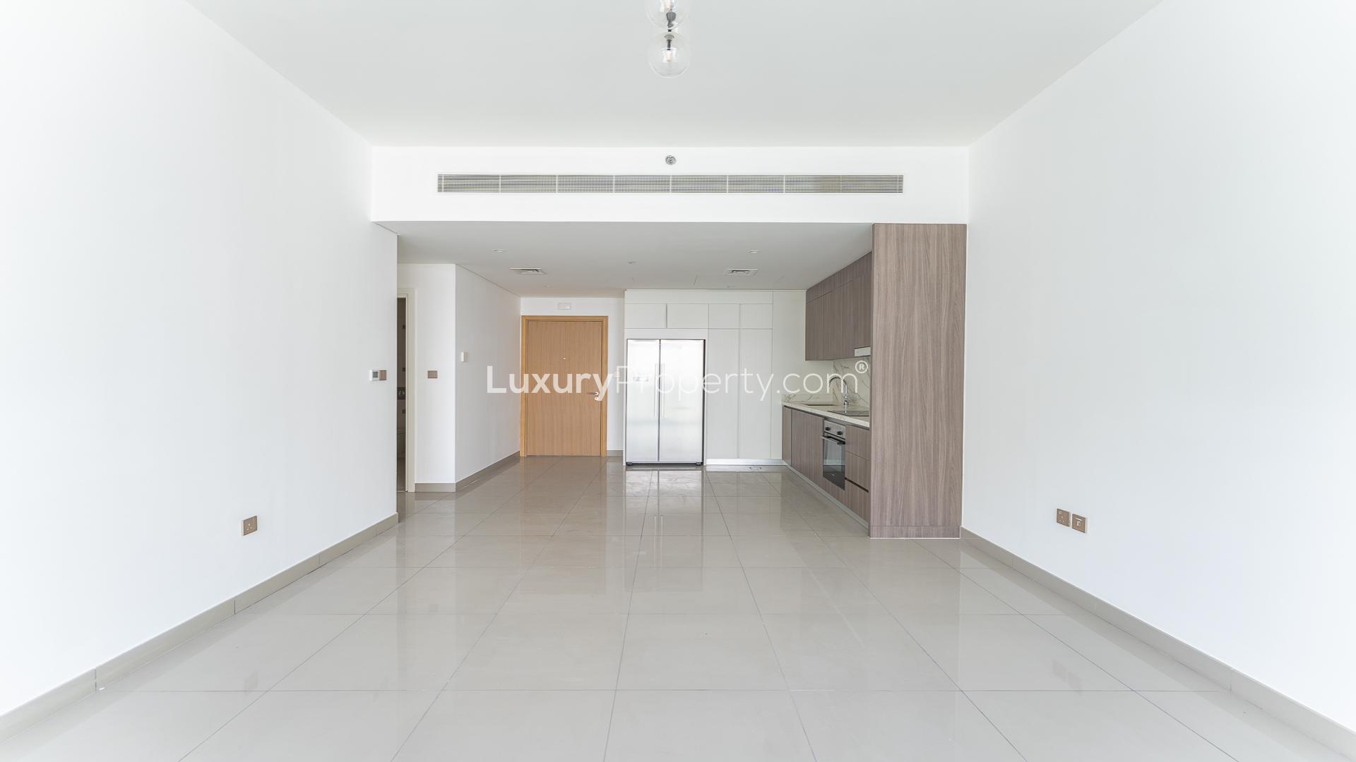 Vacant 2-bedroom apartment kitchen and living area with sea views, Emaar Beachfront, Dubai Harbour