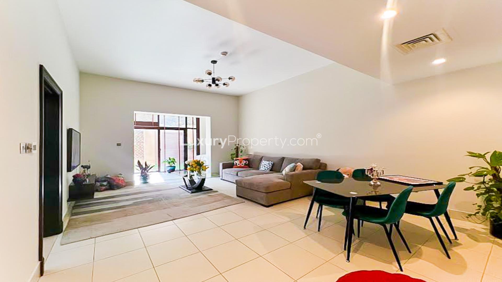 Modern living room in Reehan apartment, Old Town, with elegant decor and natural light