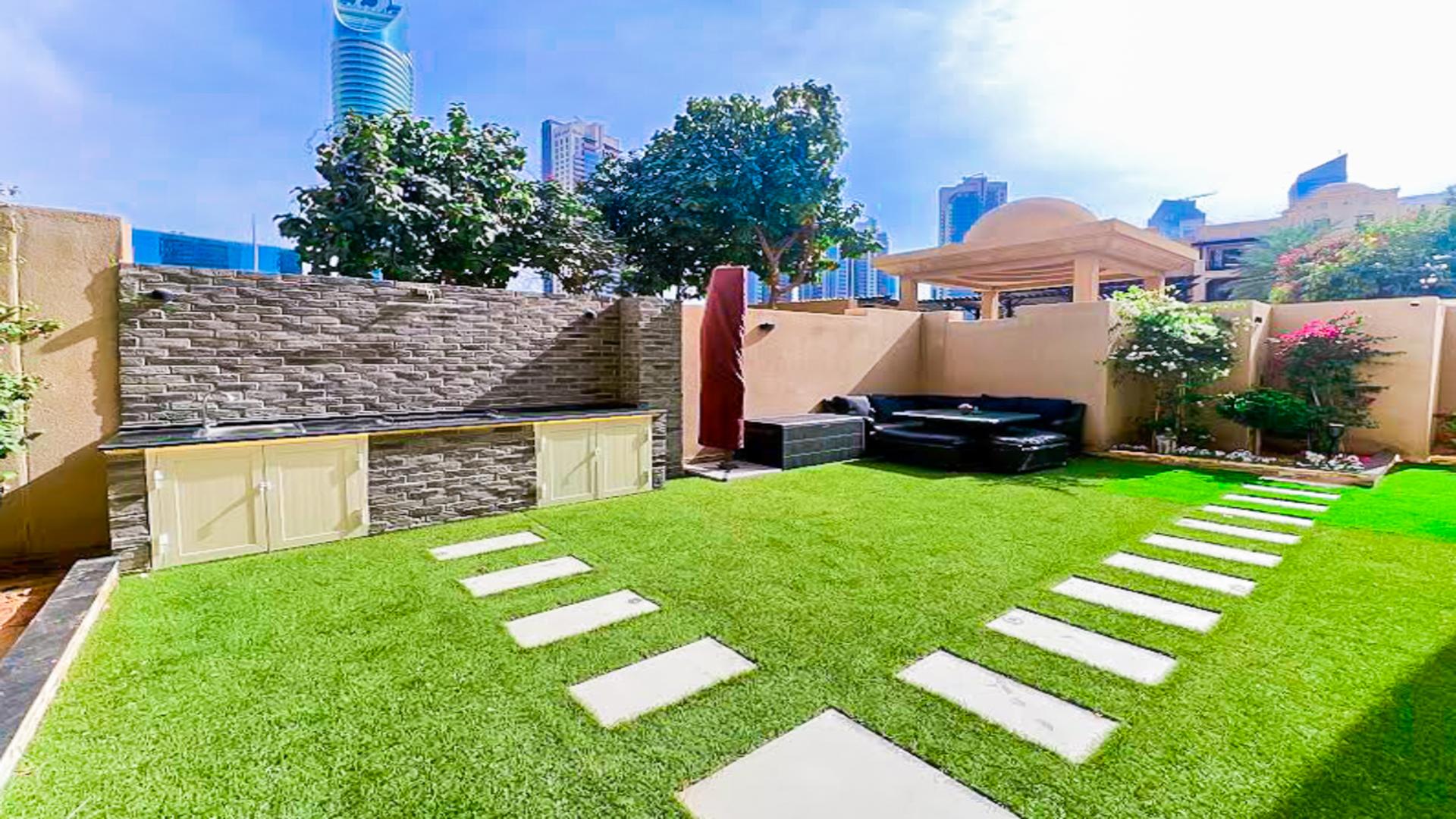 Modern living room in Reehan apartment, Old Town, with stylish decor and natural light