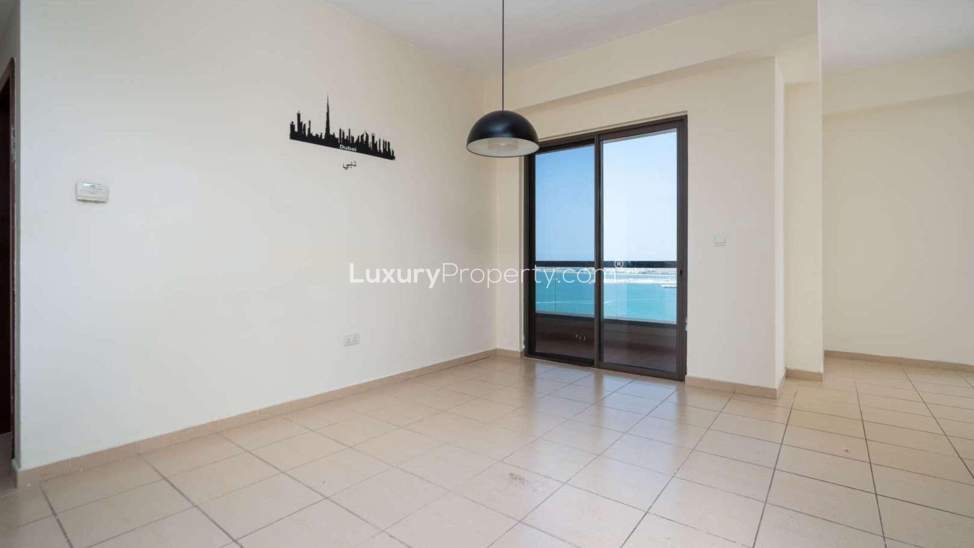 Empty living room in spacious 2-bedroom Rimal apartment, JBR, with tiled flooring