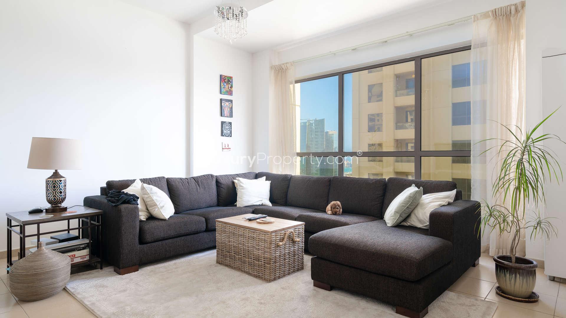 Luxurious bedroom in Rimal apartment, Jumeirah Beach Residence, with balcony view