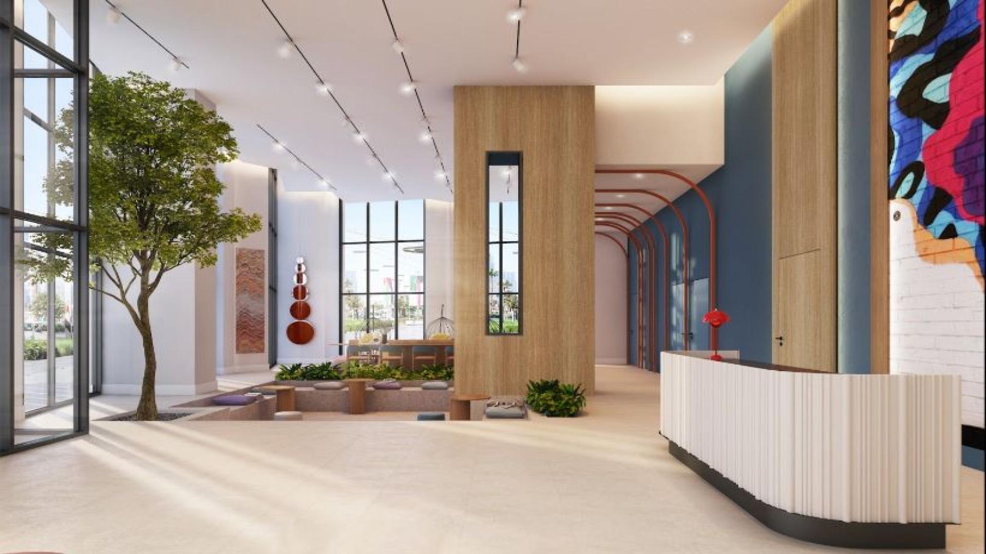 Modern kitchen and dining area in Dubai Design District apartment for sale