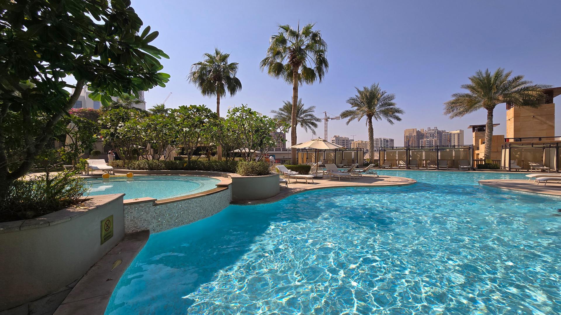 Luxurious Versace-furnished living and dining area in Culture Village apartment for sale