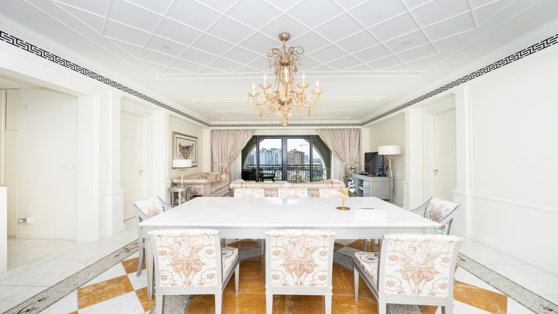 Luxurious kitchen with marble countertops in 2-bed Versace apartment, Culture Village, Dubai