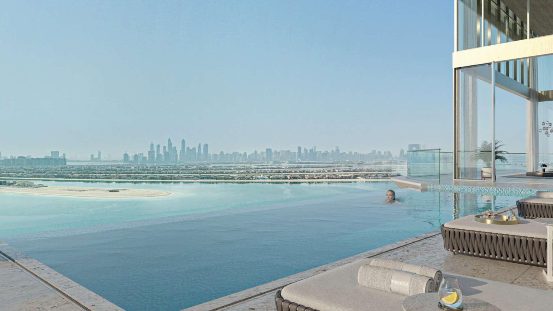Contemporary beachfront apartment balcony view at sunset in Serenia Living, Palm Jumeirah