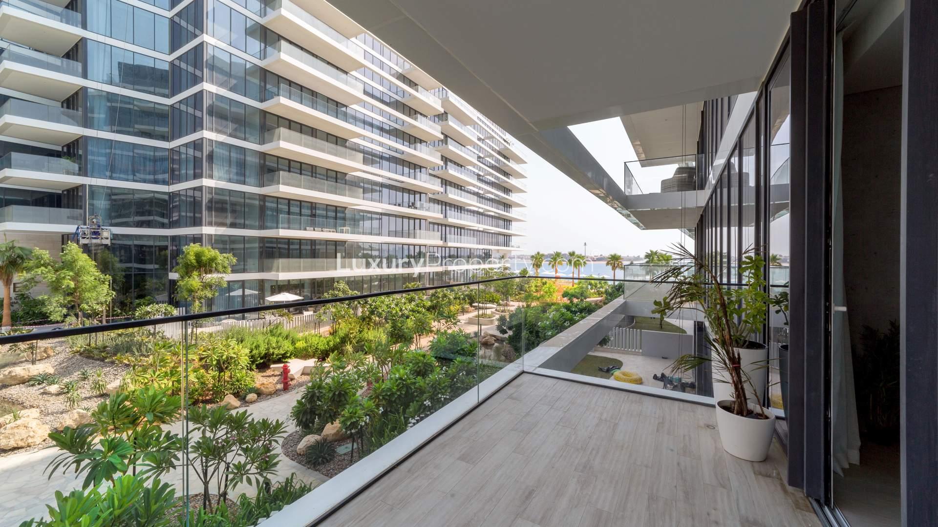 Balcony view of lush gardens at Serenia Residences, Palm Jumeirah apartment for sale