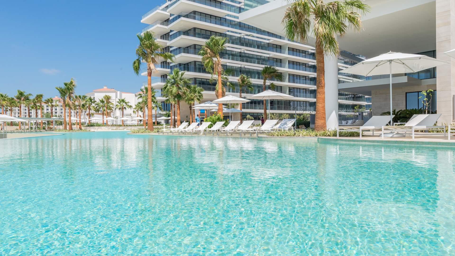 Luxurious poolside view at Serenia Residences, Palm Jumeirah apartment for sale