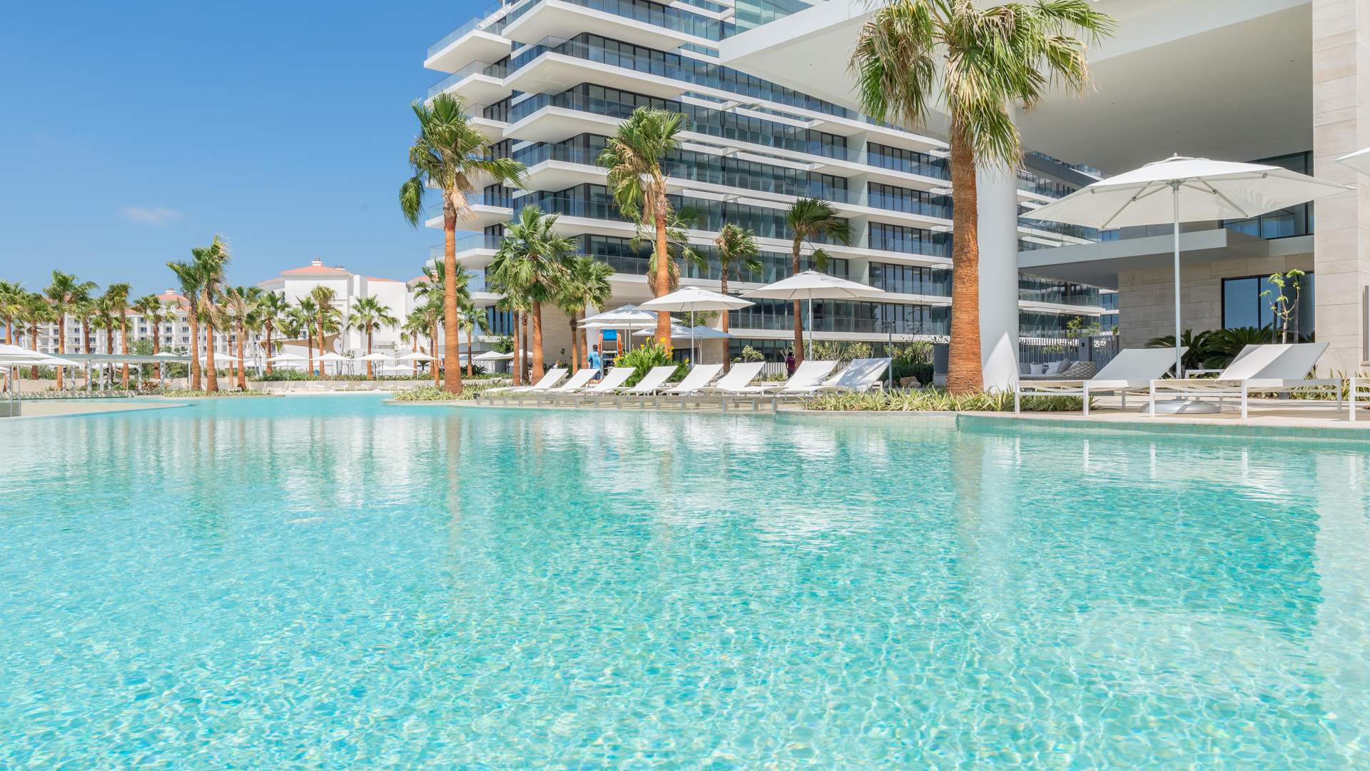 Luxurious poolside view at Serenia Residences, Palm Jumeirah apartment for sale