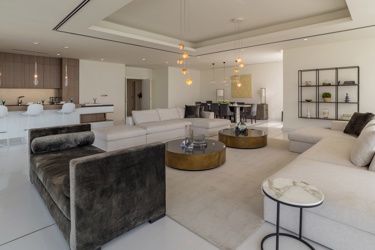 "Elegant entrance of Palm Jumeirah apartment in Serenia Residences, featuring modern decor.",Luxurious living room in Palm Jumeirah apartment, modern decor, open-plan design, Serenia Residences