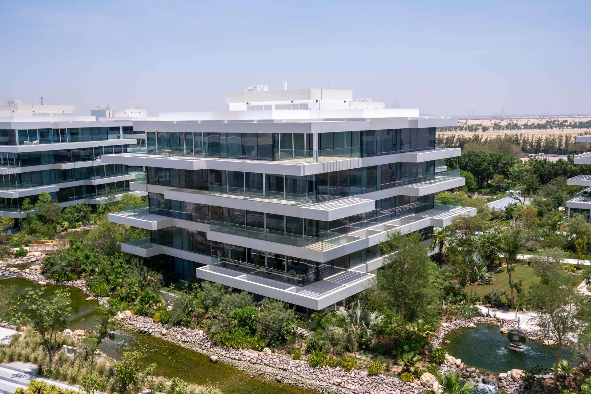 Empty room with white walls in Seventh Heaven Apartment, Al Barari