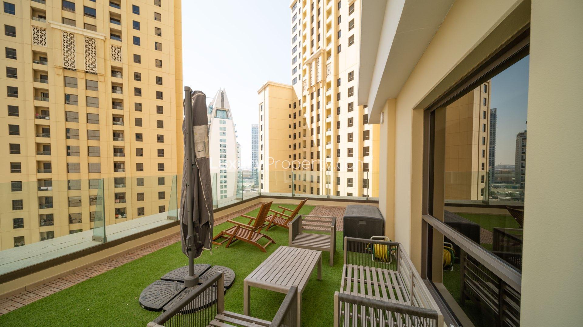 Furnished living room in 2-bedroom apartment, Jumeirah Beach Residence, Dubai, with modern decor