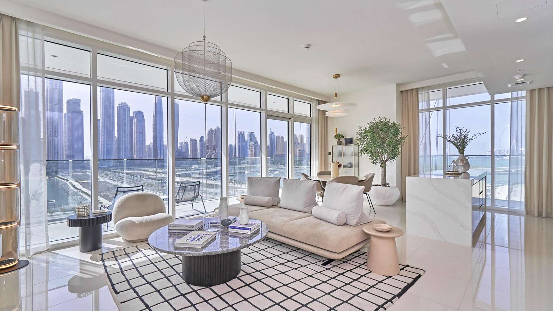 Balcony view of Dubai skyline from stylish Emaar Beachfront apartment, Shorefront Residences