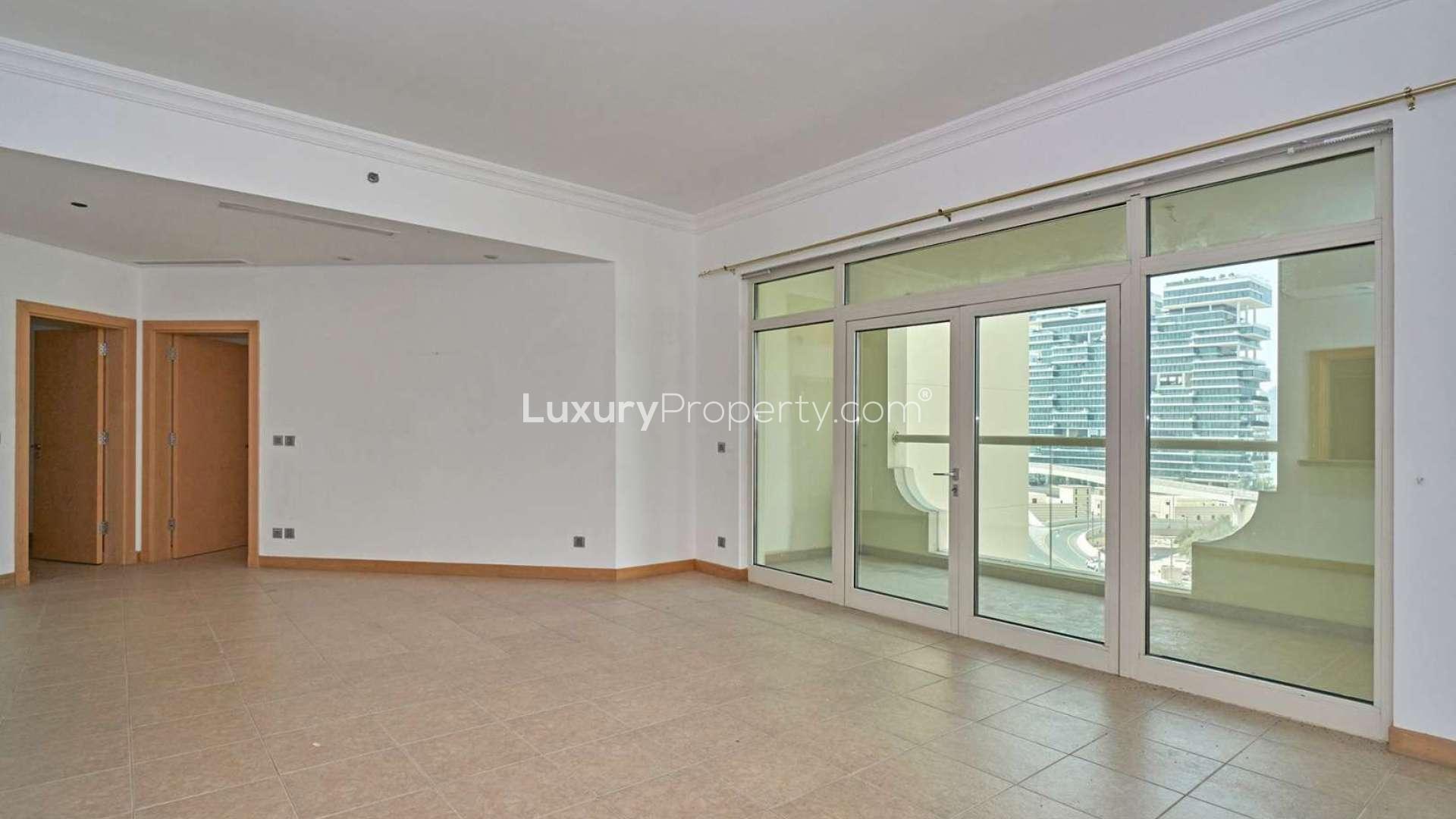 Spacious living room in 2-bedroom apartment, Al Khudrawi, Palm Jumeirah, with large windows