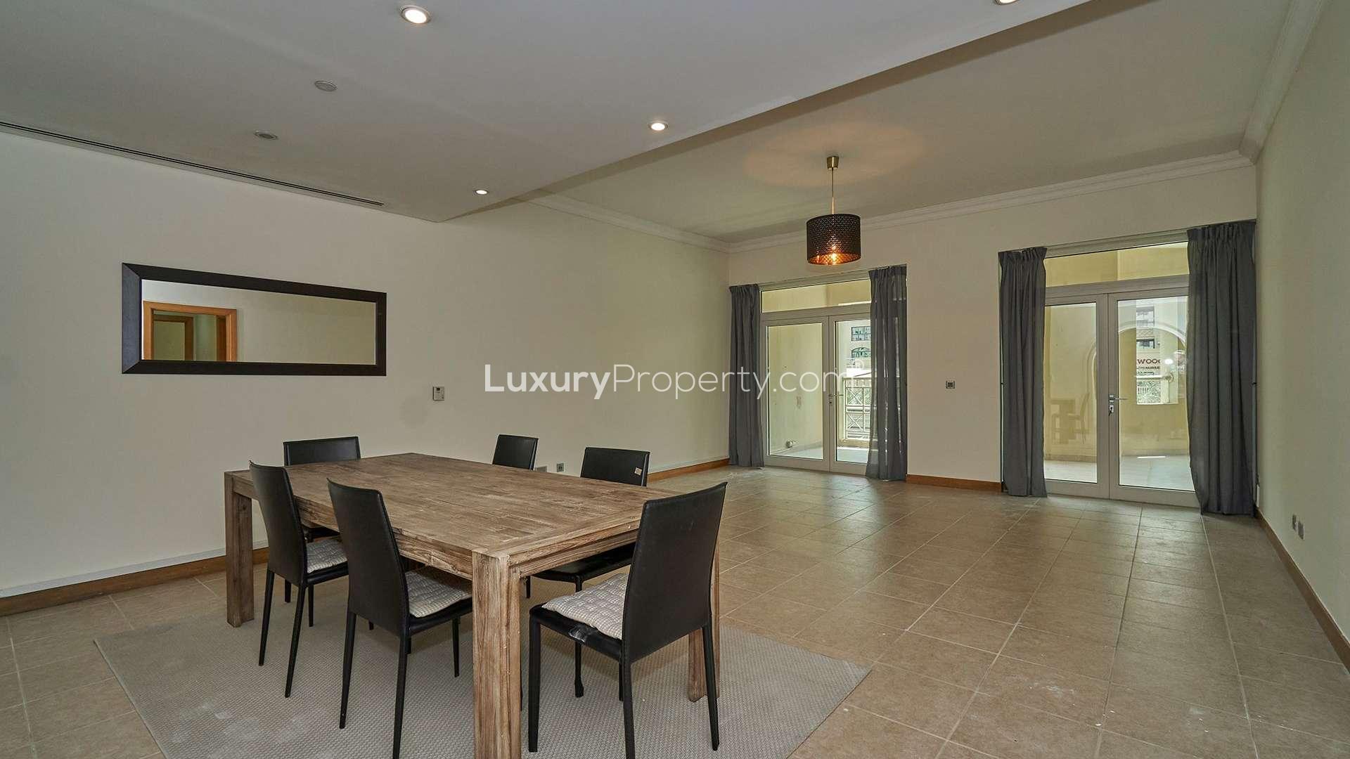 Beachfront apartment view, Palm Jumeirah, Shoreline Apartments, lush greenery, residential community