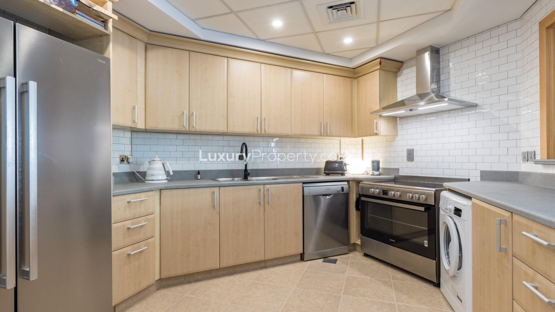 Hallway in upgraded 2-bedroom Shoreline apartment, Palm Jumeirah, with stylish decor and natural light