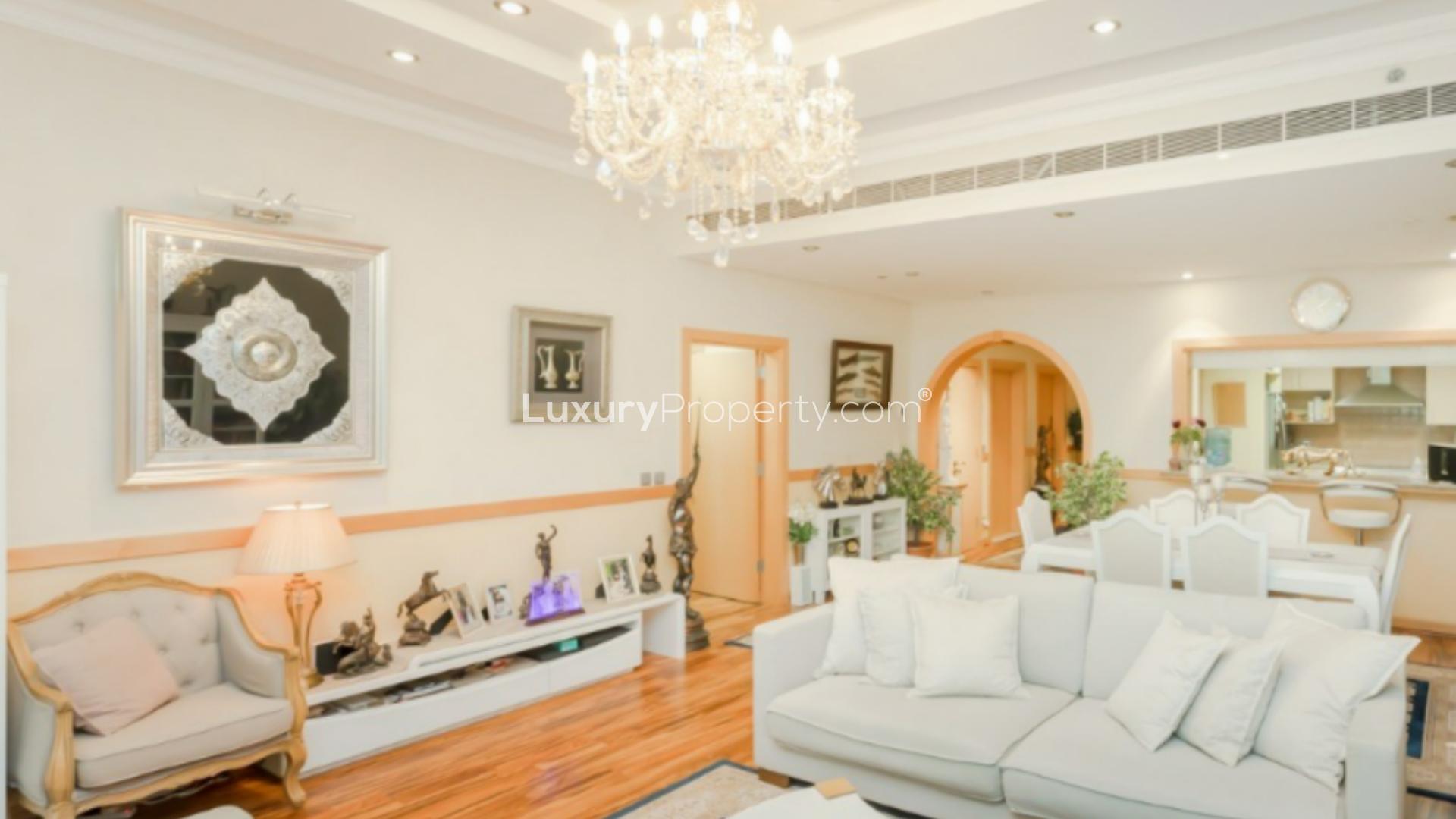 Living room in Shoreline Apartment, Palm Jumeirah with elegant decor and cozy seating