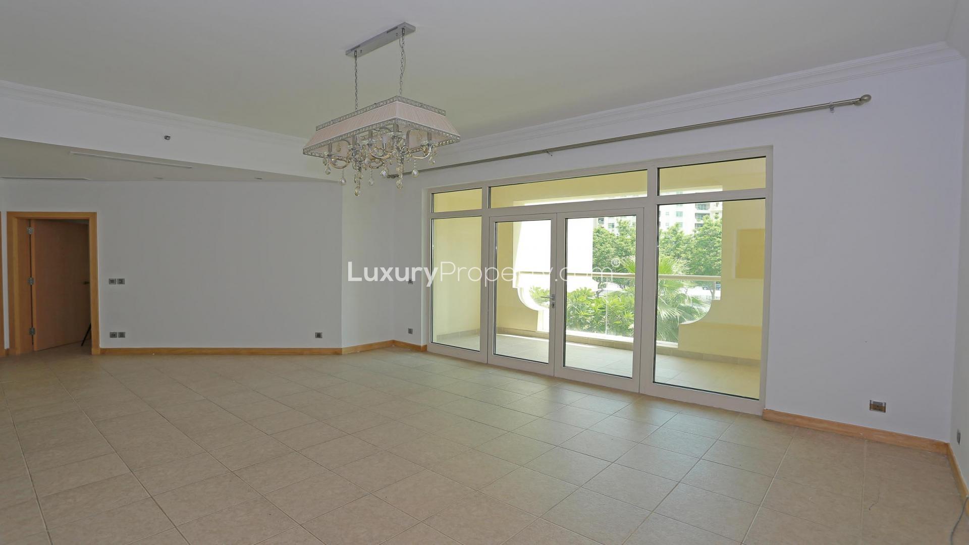 Modern kitchen in upgraded Shoreline Apartments, Palm Jumeirah, with sleek cabinetry and appliances